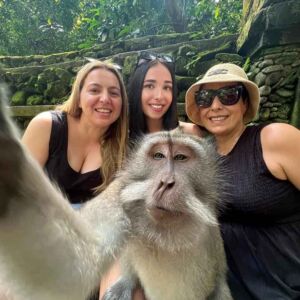 ladies-taking-a-selfie-with-a-friendly-monkey-in-bali