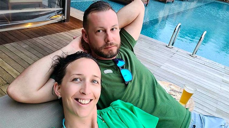 couple relaxing by their private pool in the maldives