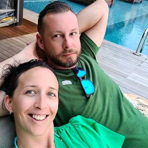 couple relaxing by their private pool in the maldives